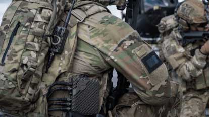 Soldier wearing an Edge Device on their gear